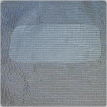 La réparation terminée. Sur une grande déchirure comme celle-ci, il convient de mettre une pièce sur les deux faces.