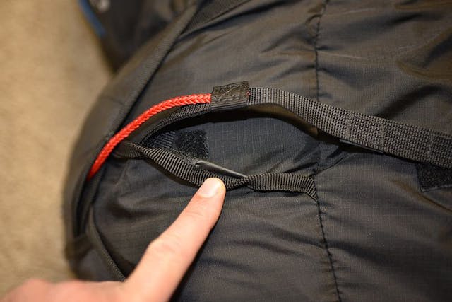 Incorrect, make sure the strap is routed below the small Velcro patch.